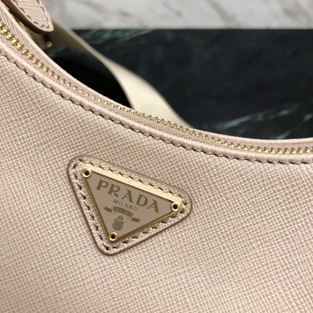 프라다 리에디션 가죽 숄더백 핑크 1BH204