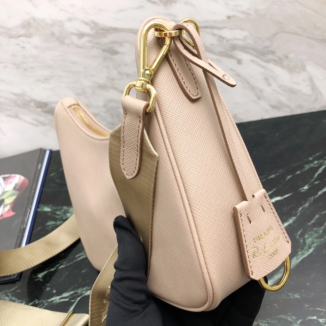 프라다 리에디션 가죽 숄더백 핑크 1BH204