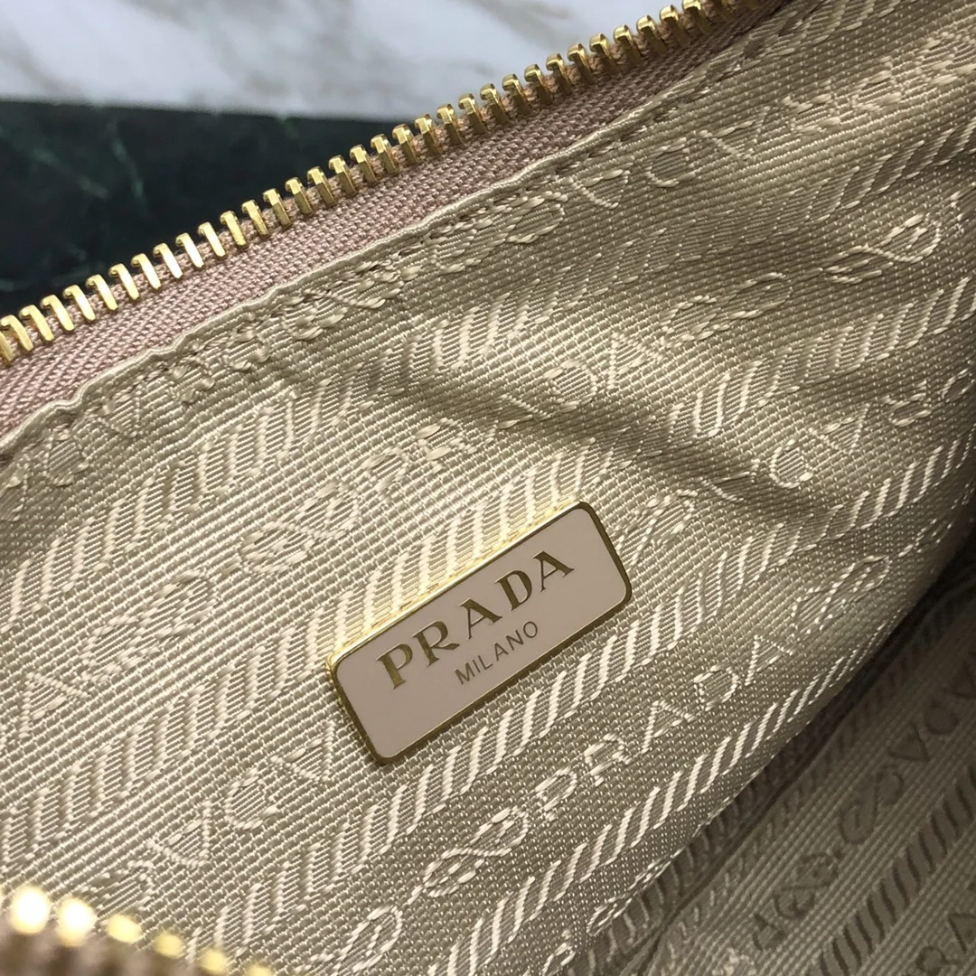 프라다 리에디션 가죽 숄더백 핑크 1BH204