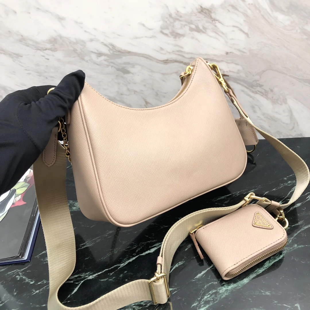 프라다 리에디션 가죽 숄더백 핑크 1BH204